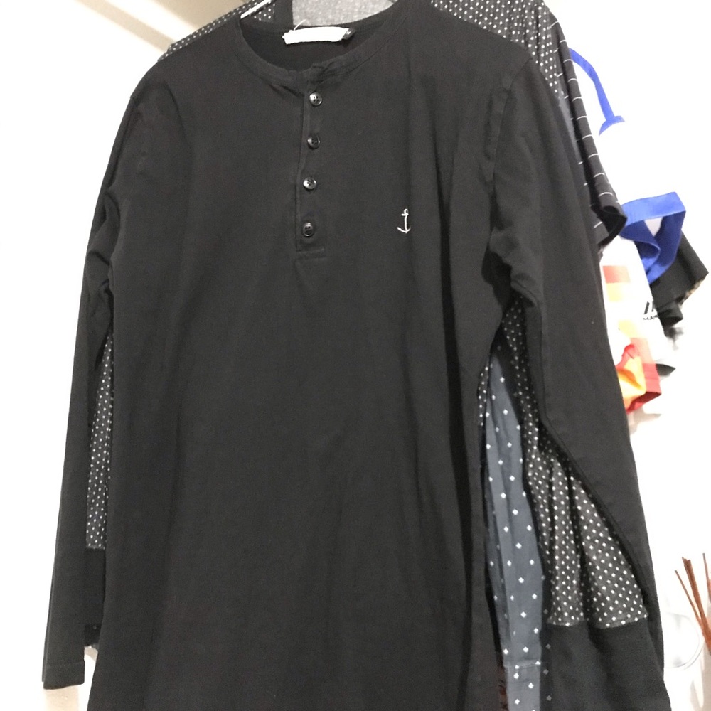 The blue uniform black Henley
